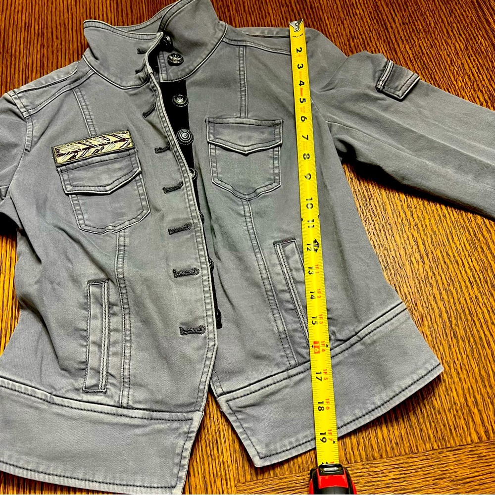 Woman’s gray denim jacket